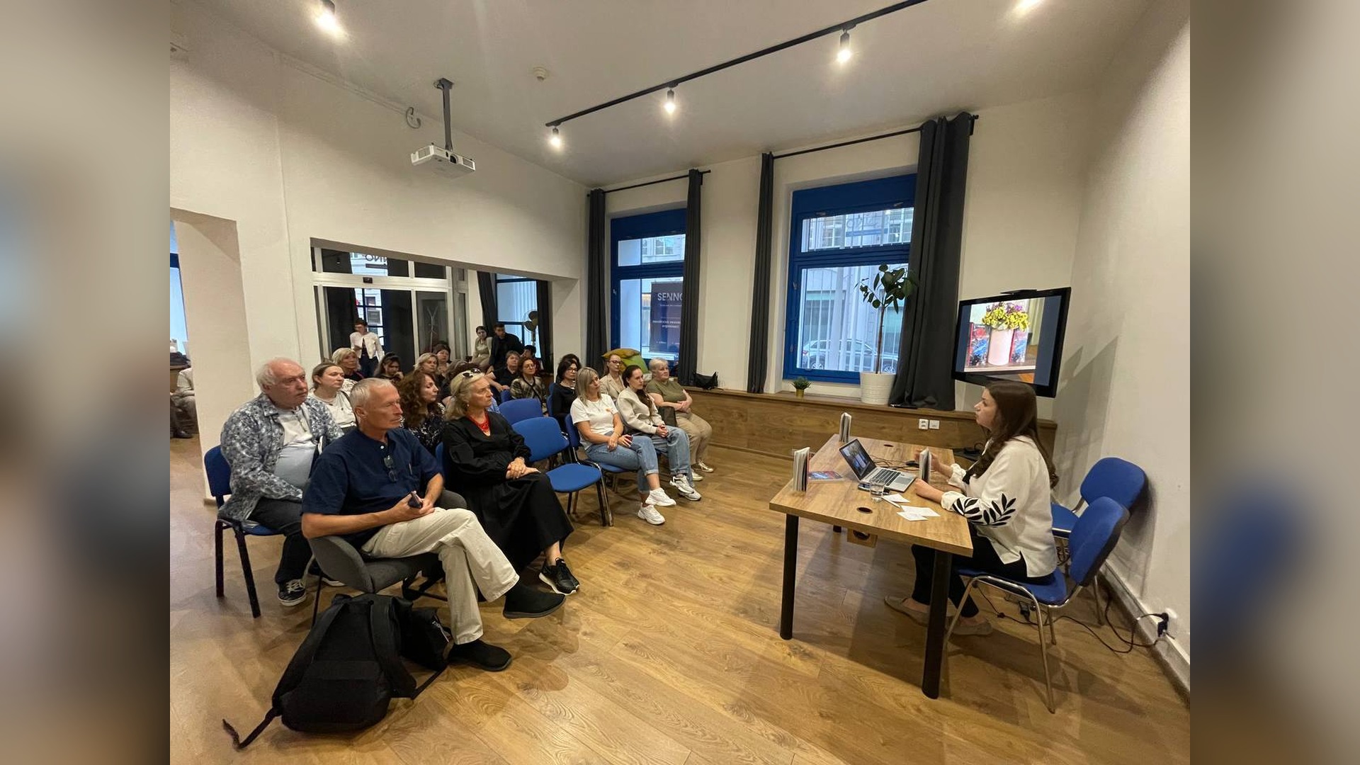 Nadiia Malovana speaking at the presentation of the book about Hostomel in Prague