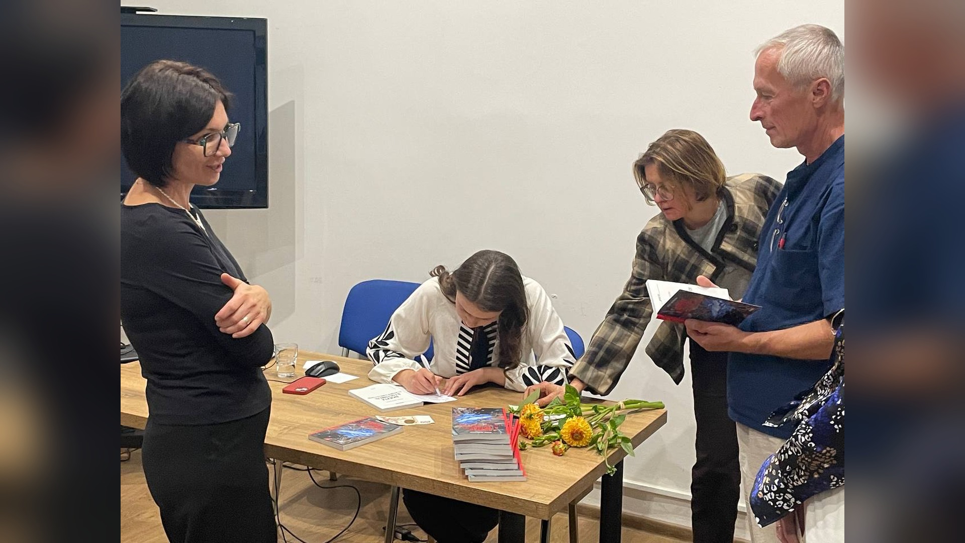 Book signing of Surviving Hostomel at the presentation in Prague