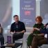 Колаж з обкладинкою книги «Звір у машині» Джорджа Доерті та учасниками презентації у Львові